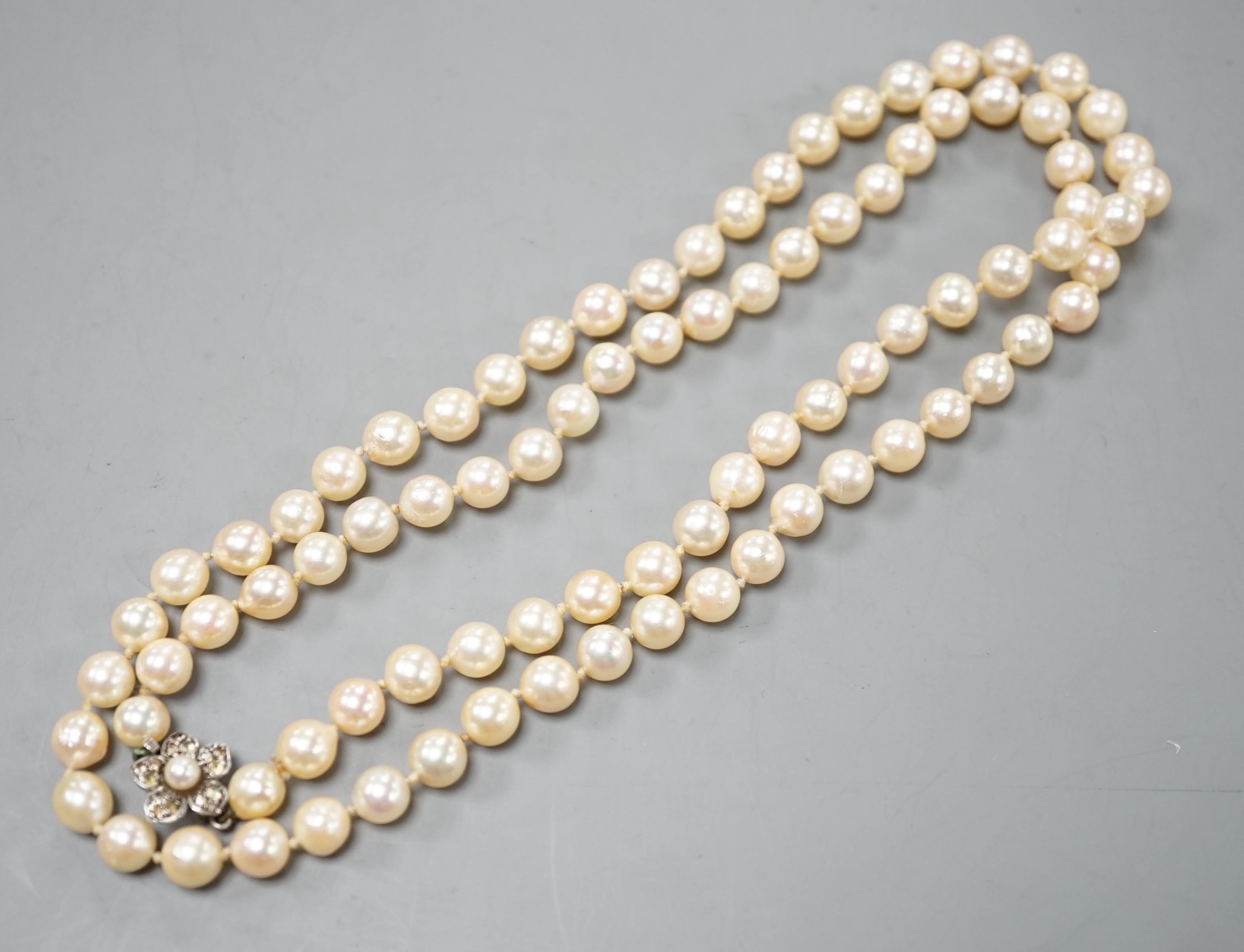 A single strand culture pearl necklace with cultured pearl set sterling clasp, 74cm.